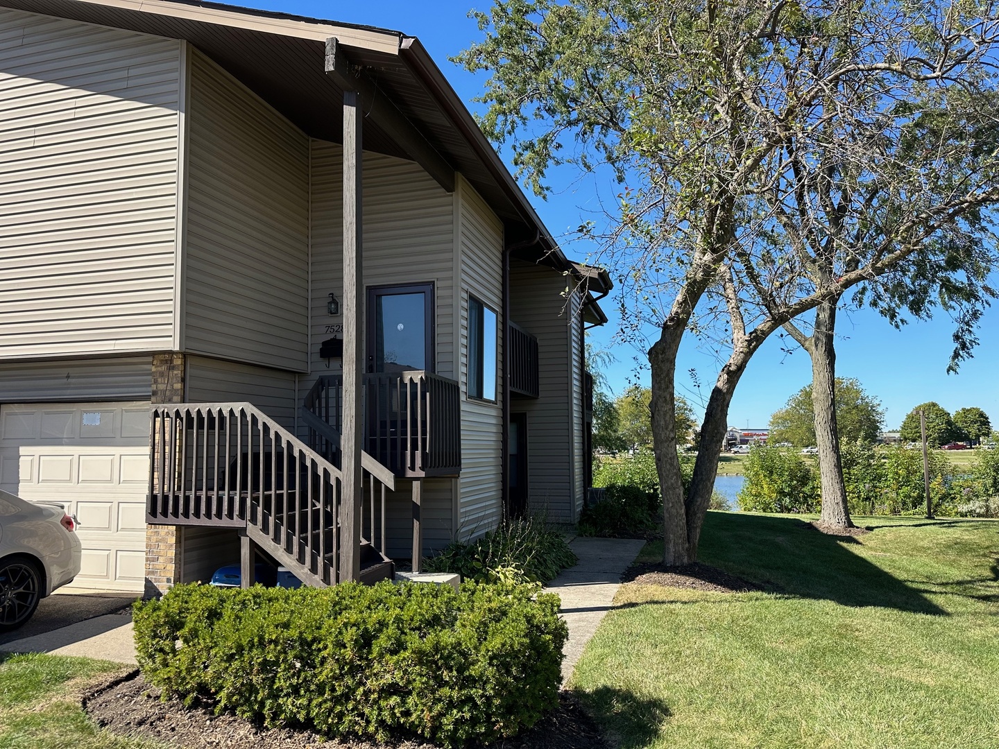 a view of a house with a yard