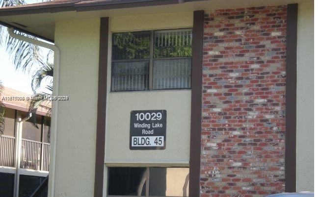 a brick wall with a window