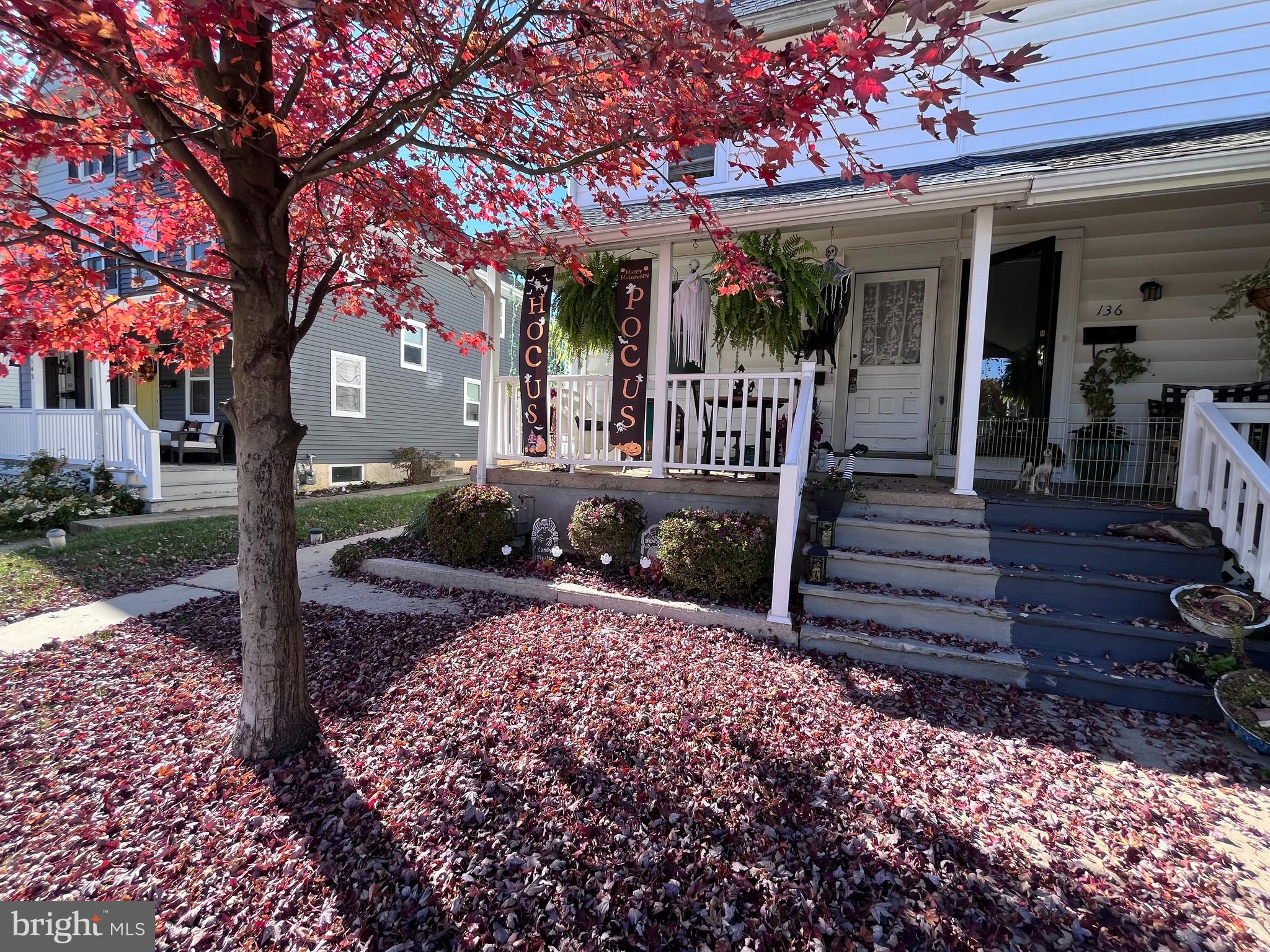 a front view of a house with a porch