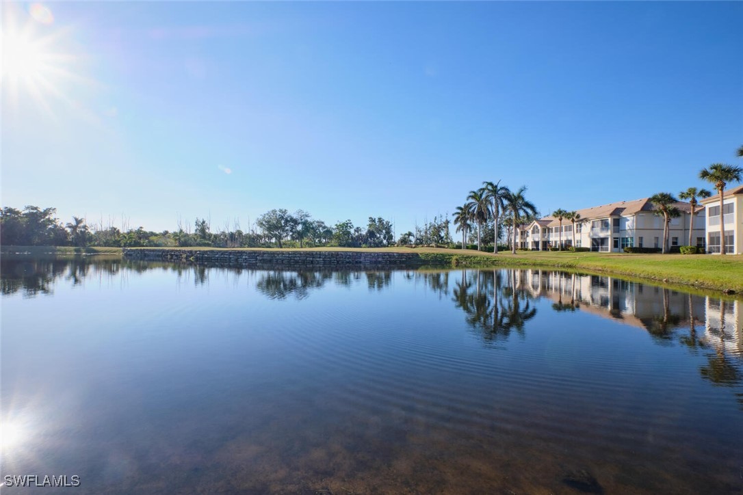 a view of a lake with houses with outdoor space