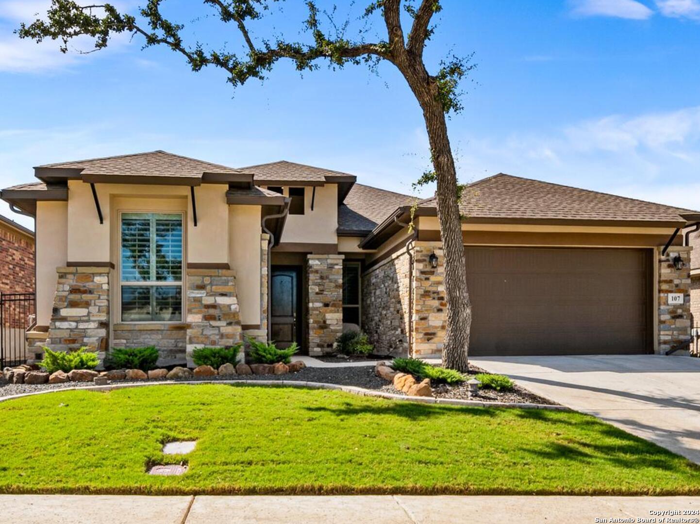 front view of a house with a yard