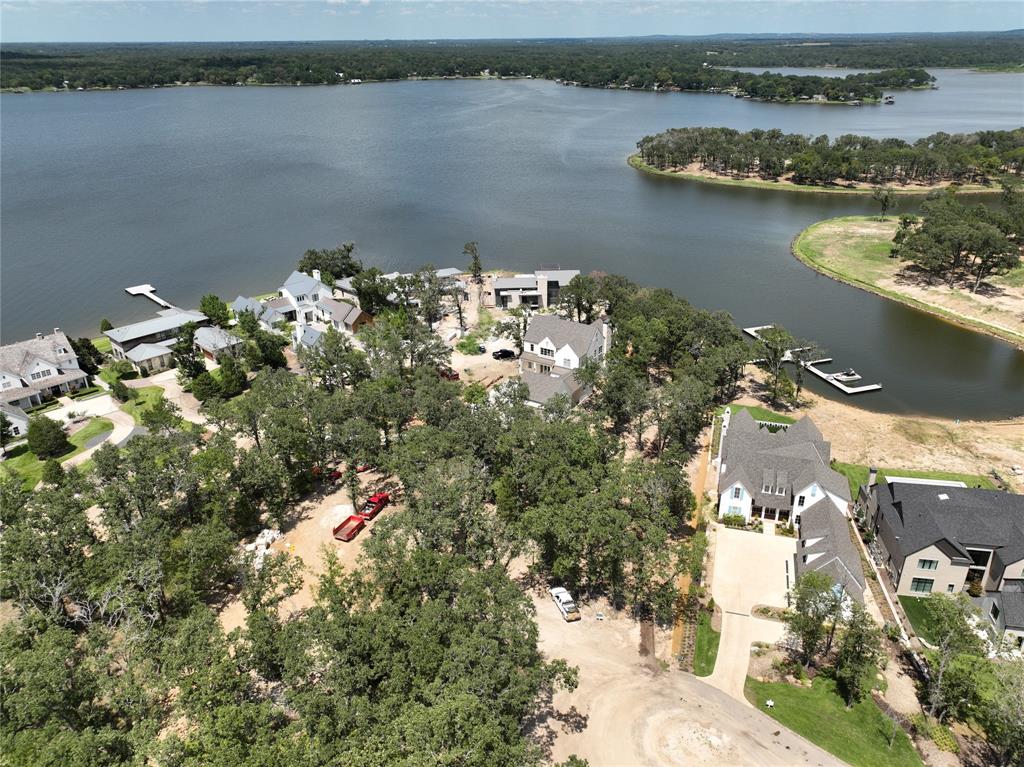 an aerial view of a houses with outdoor space