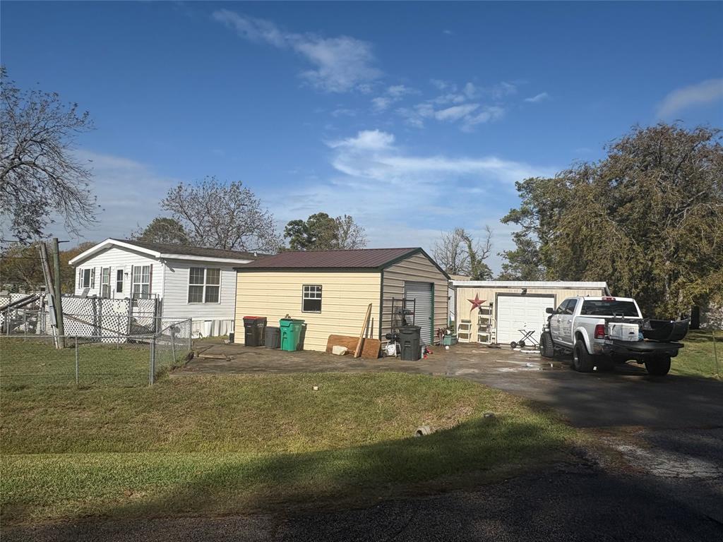 Shop Area, Storage, & Carport