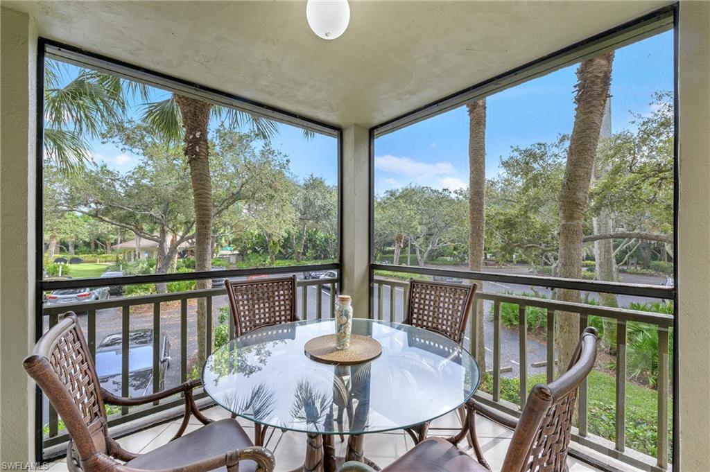 a view of a city from a dining room with furniture window and outside view