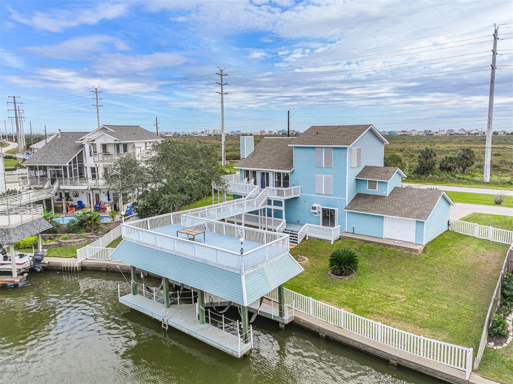 a view of a house with swimming pool