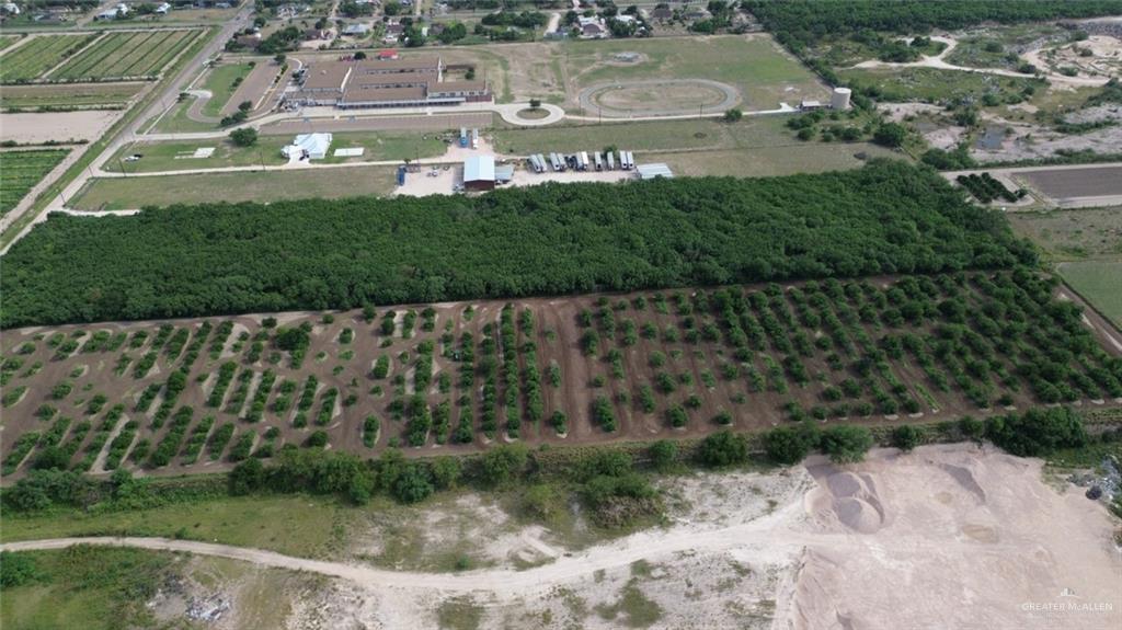 a aerial view of a house with a yard