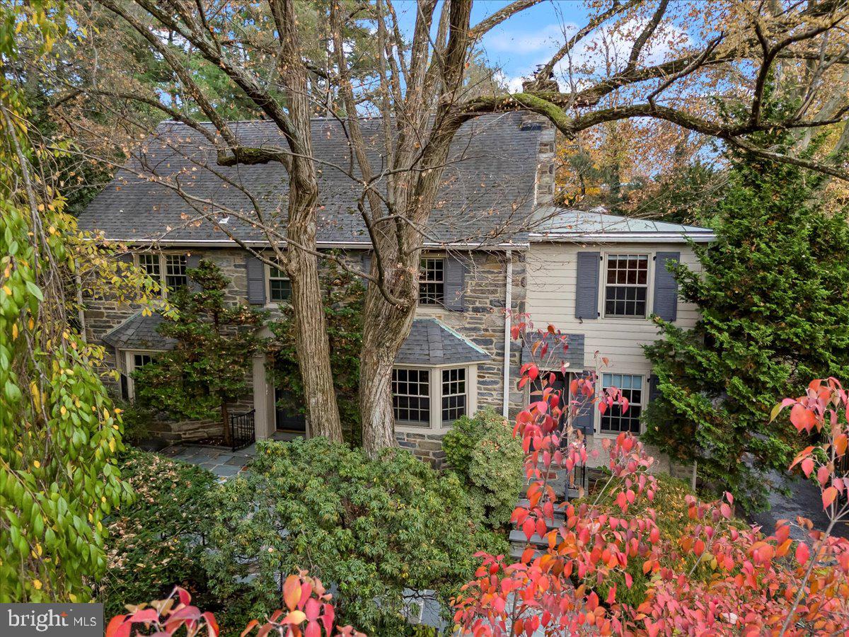 front view of a house with a small yard