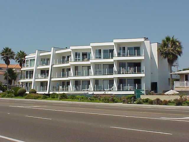 a front view of a building with a street