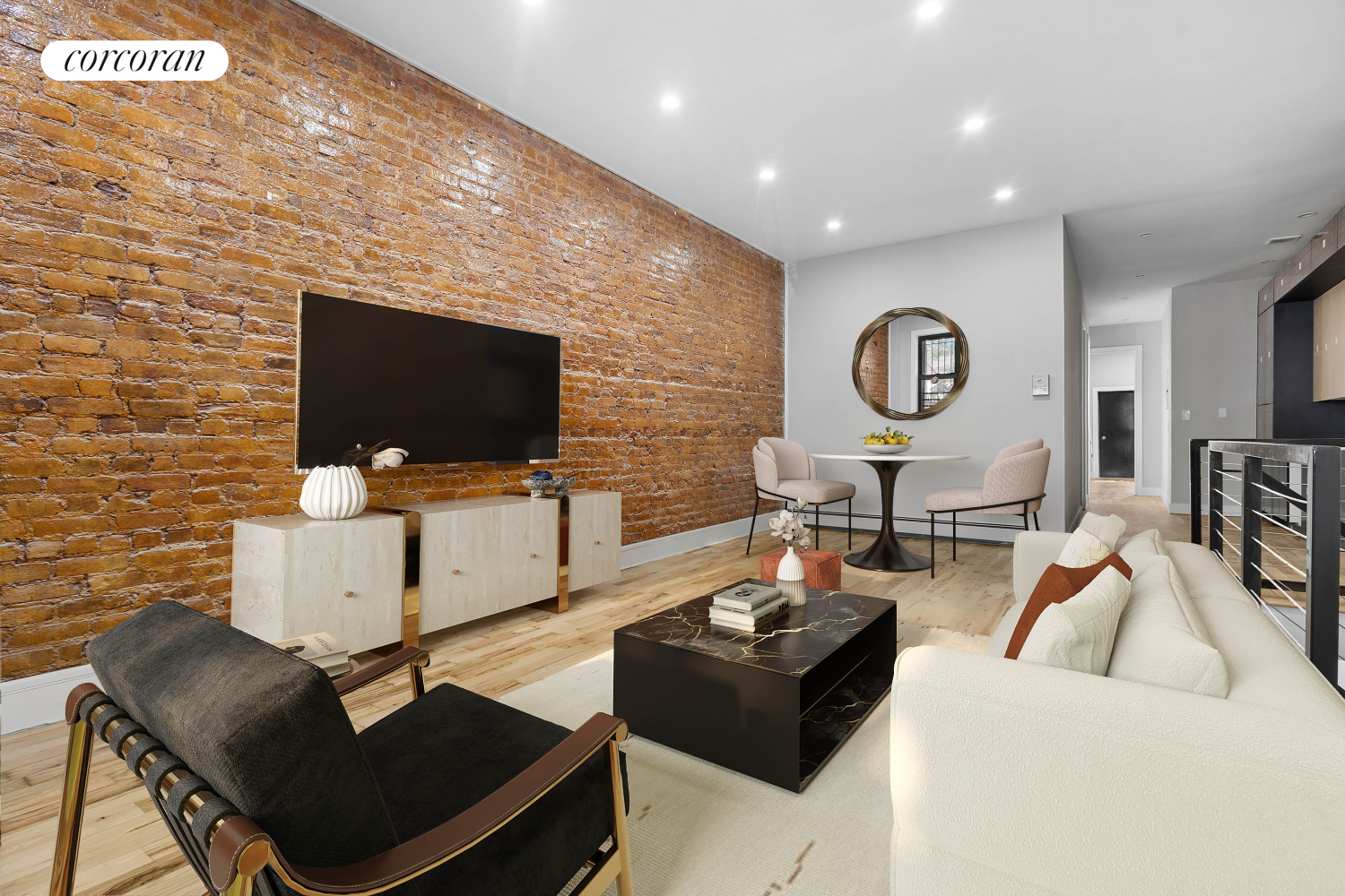 a living room with furniture and a flat screen tv