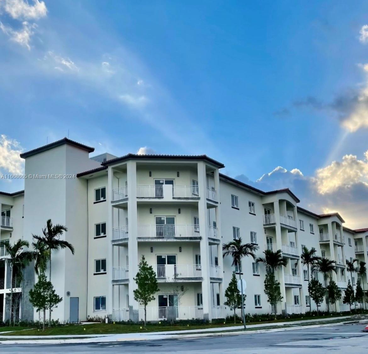 a front view of a building with street view