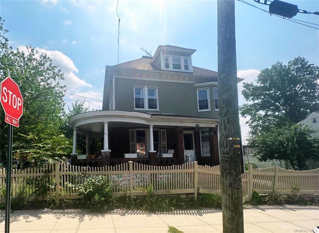 a front view of a house with porch