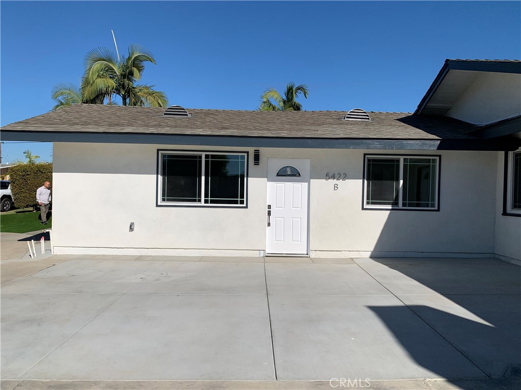 a front view of a house with a garage