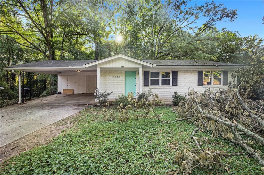 front view of a house with a yard