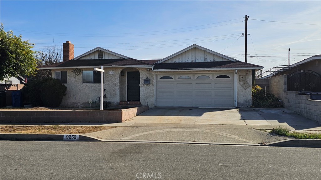 a front view of a house with yard