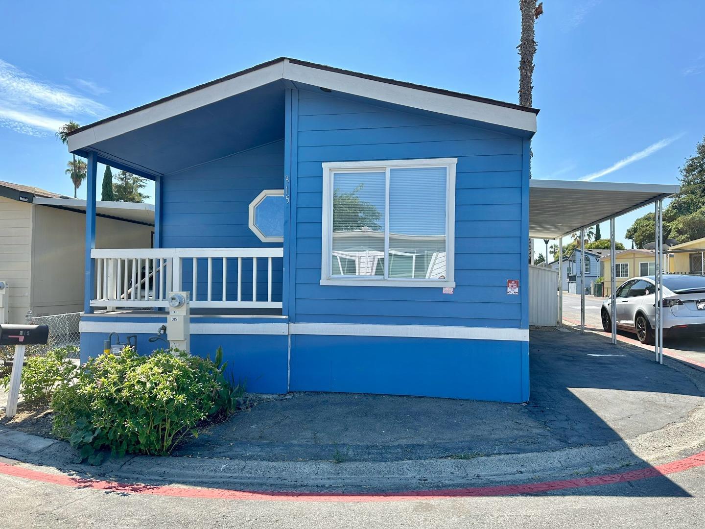 a view of a house with a patio