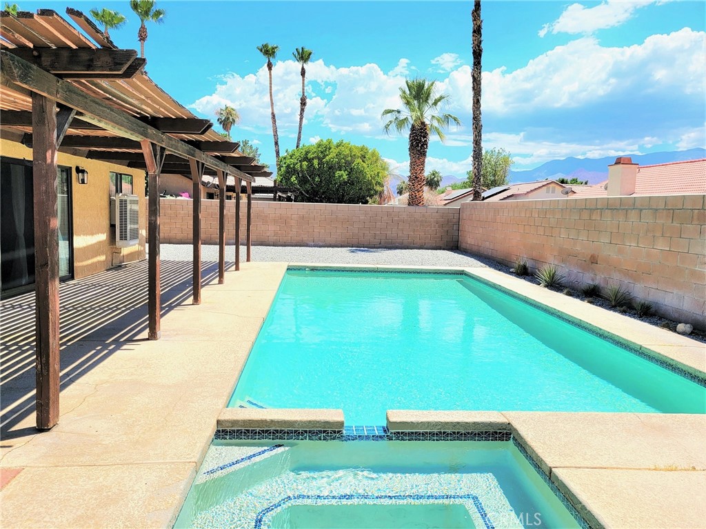 a view of an outdoor space with swimming pool