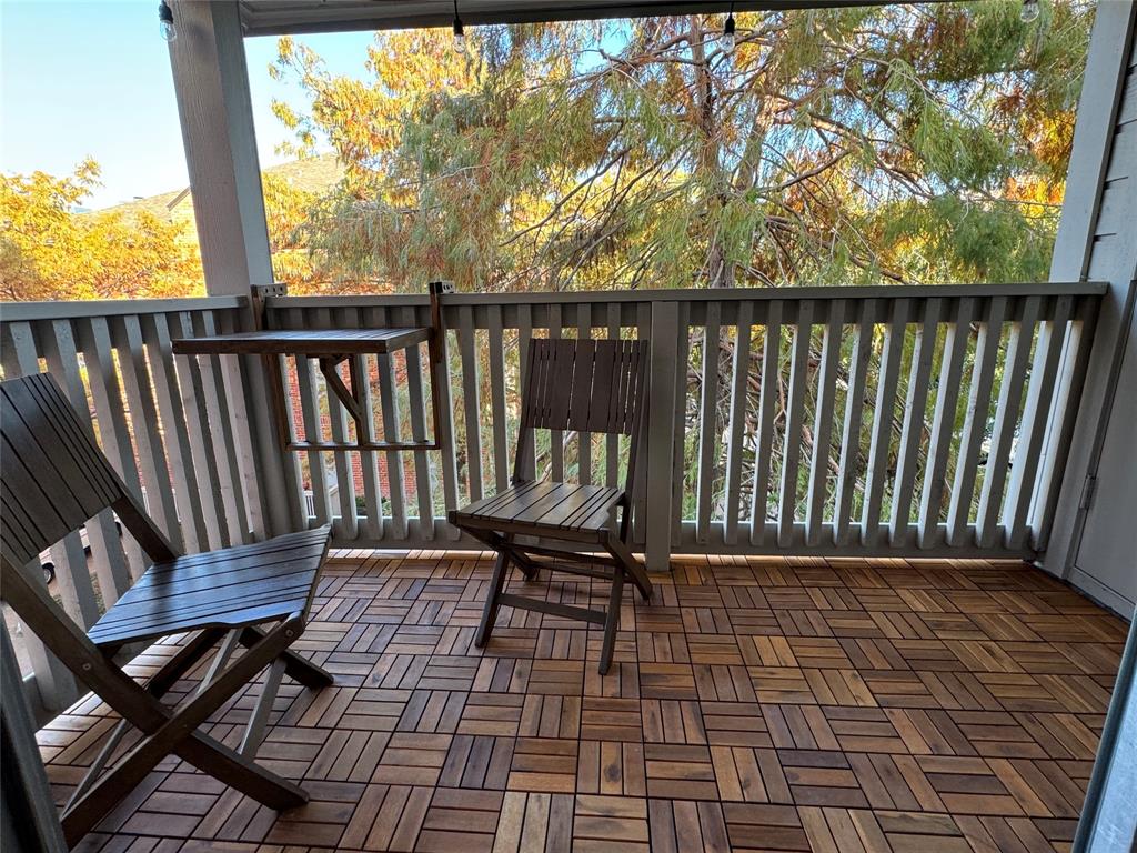 a view of a chairs on the roof deck