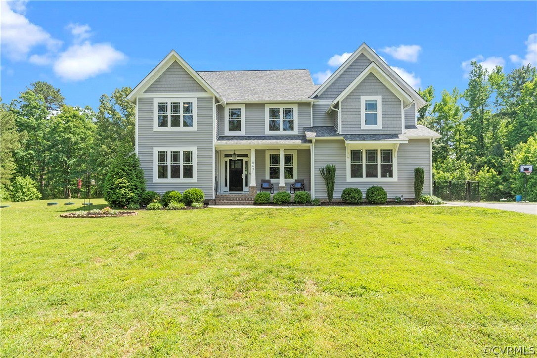 a front view of a house with swimming pool