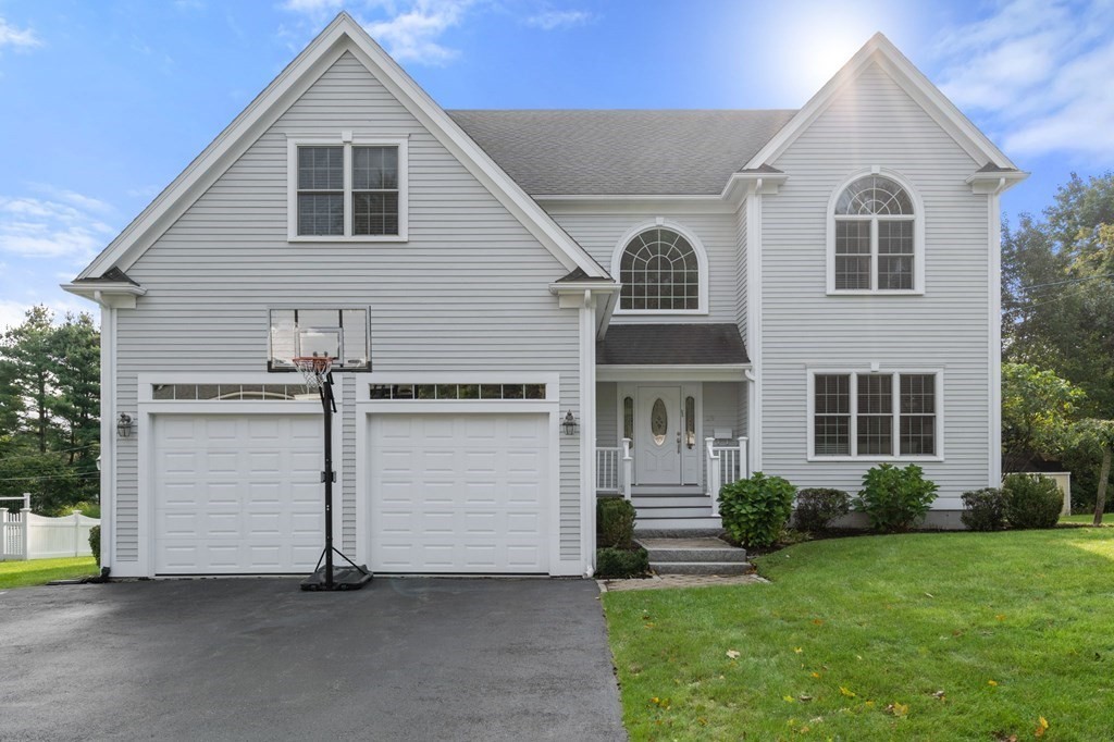 a front view of house with yard