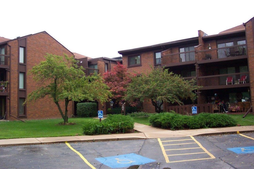 a view of a building with a yard