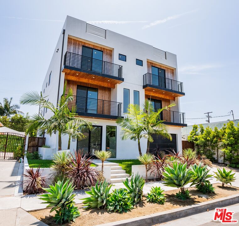 a house view with a garden space