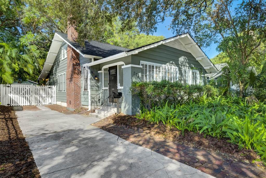 a house with trees in front of it