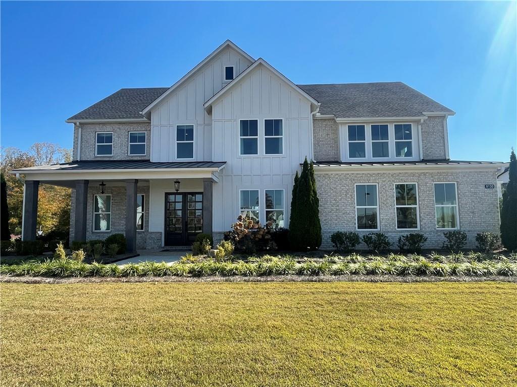 a front view of house with yard