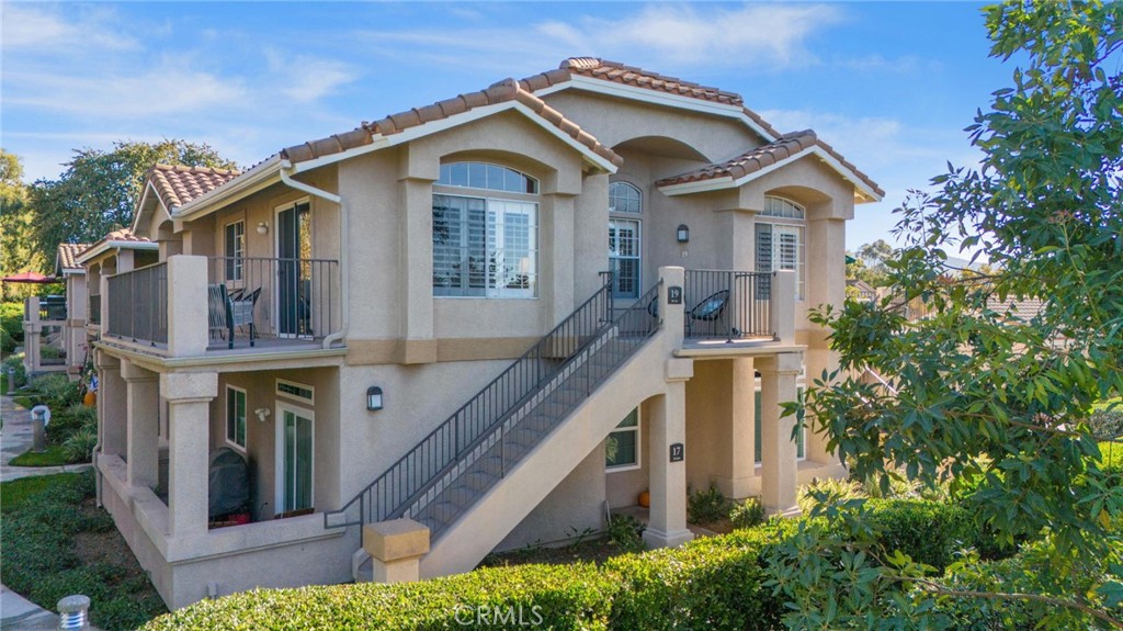 a front view of a house with balcony