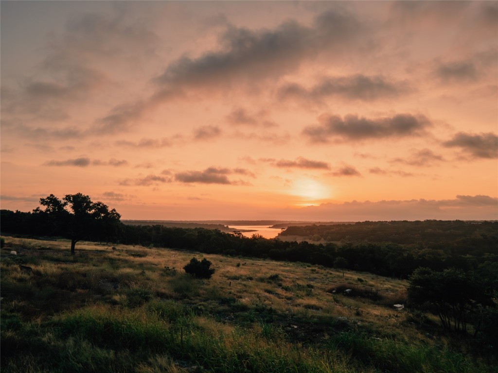 a view of sunset and yard