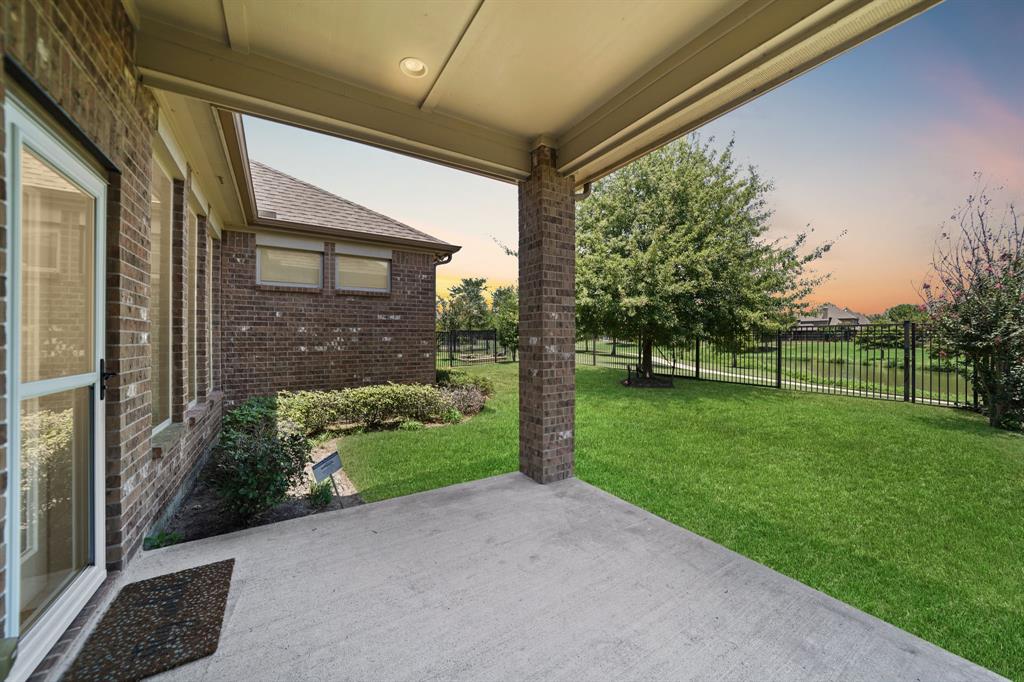 a view of a house with a big yard