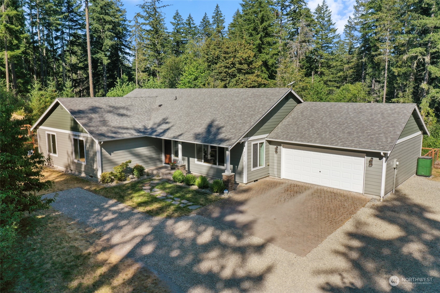 a aerial view of a house with a yard