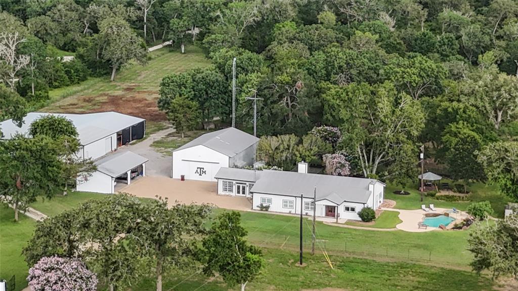 an aerial view of a house with a garden