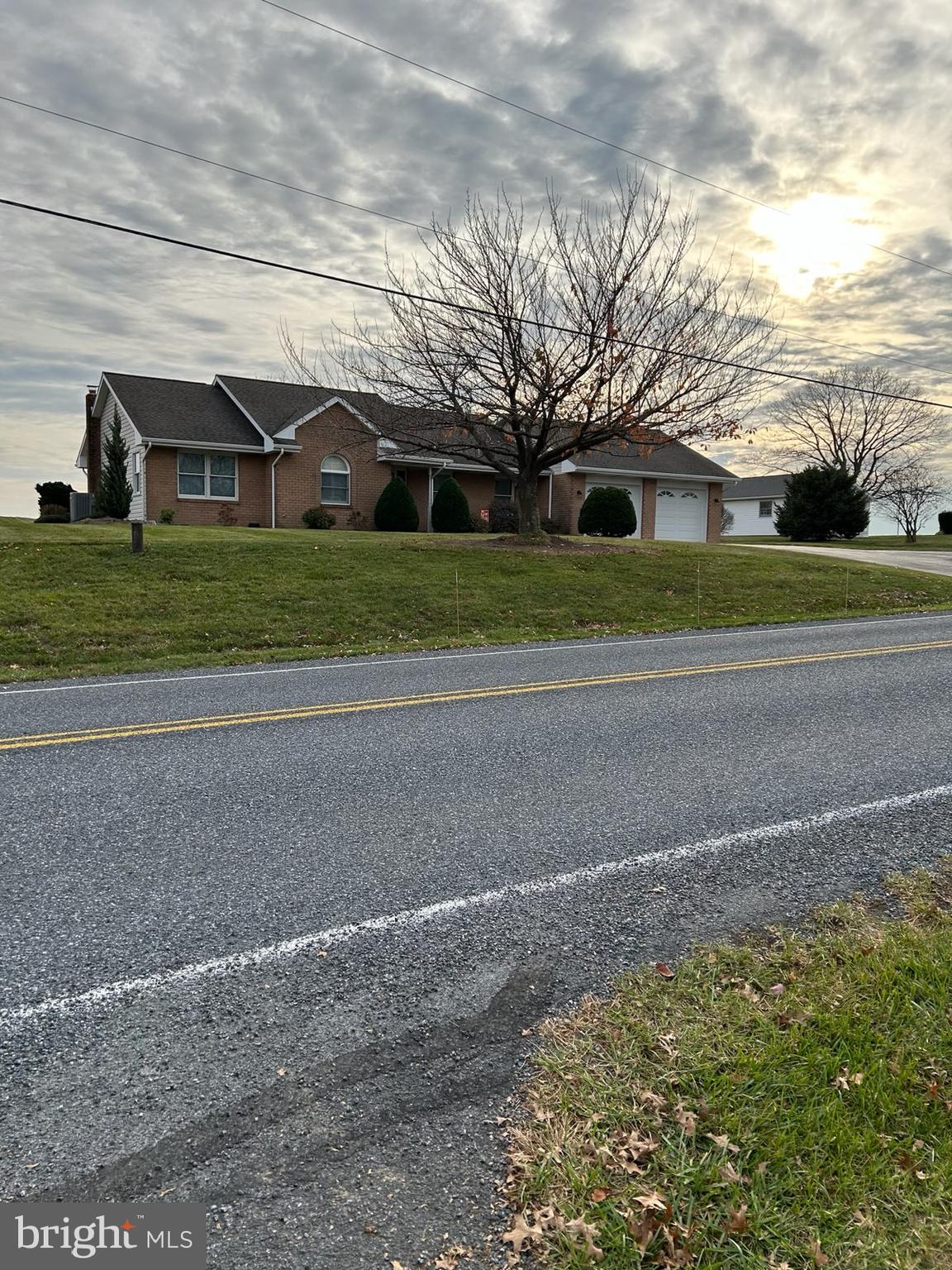 a view of house with a street