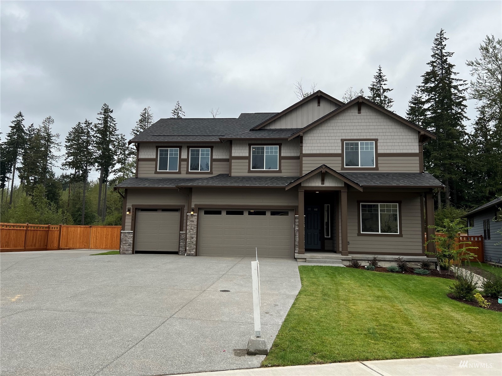 front view of a house with a yard