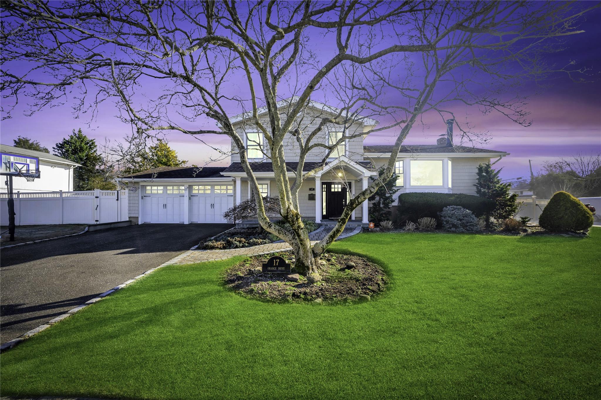 View of front of home with a lawn