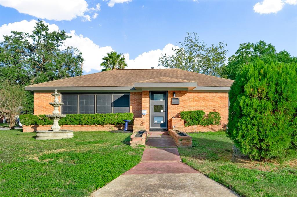 This remodeled beauty sits on a large corner lot.