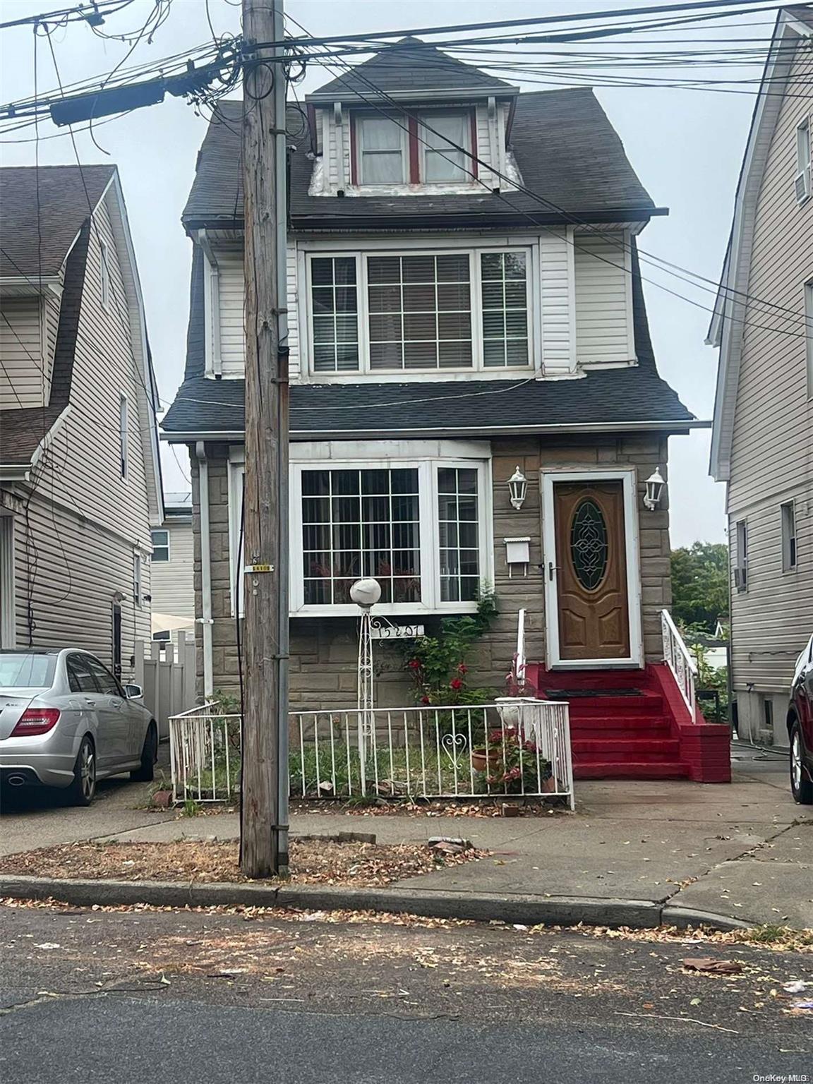 a front view of a house with a porch