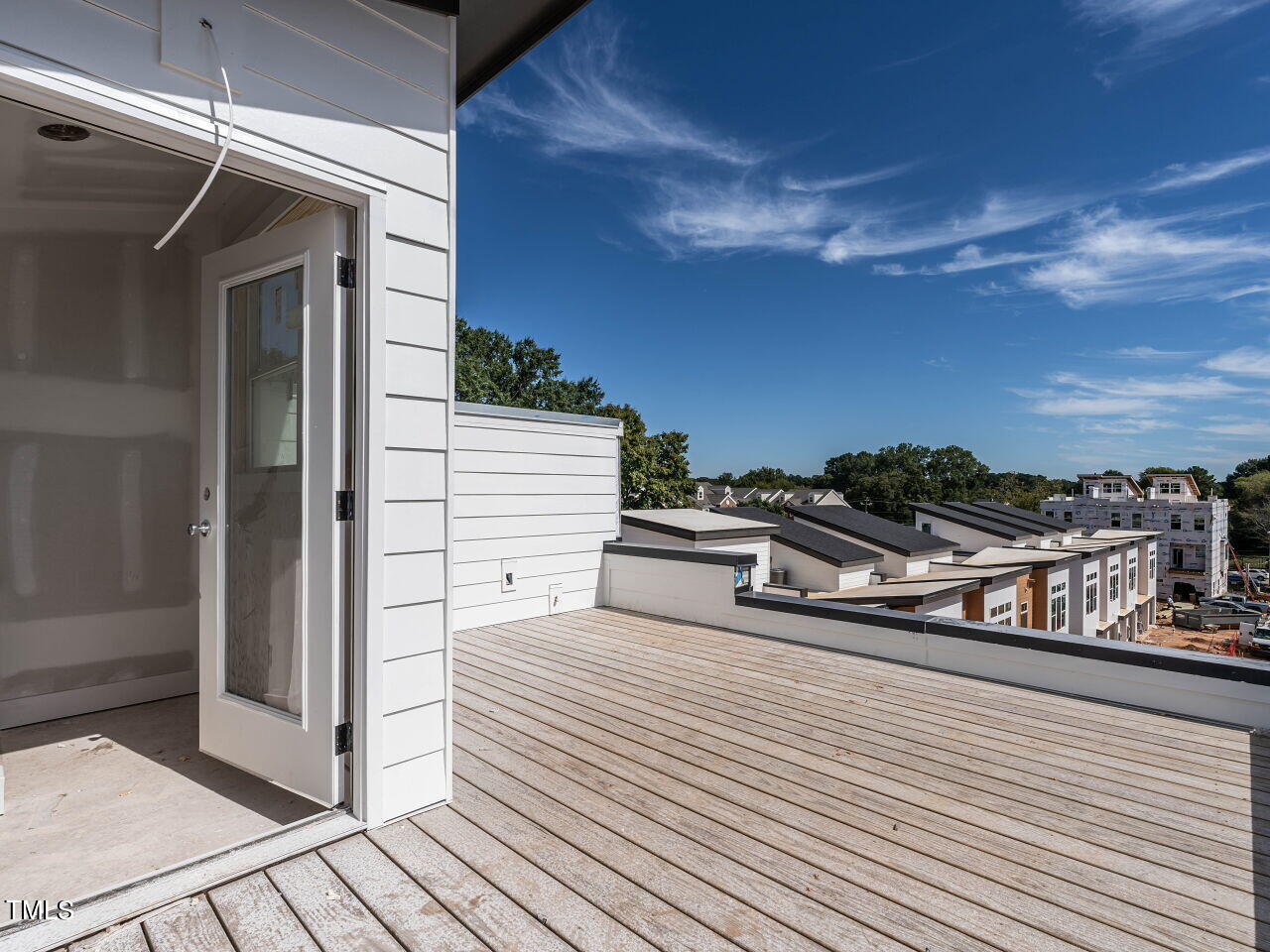 a view of a balcony with chairs