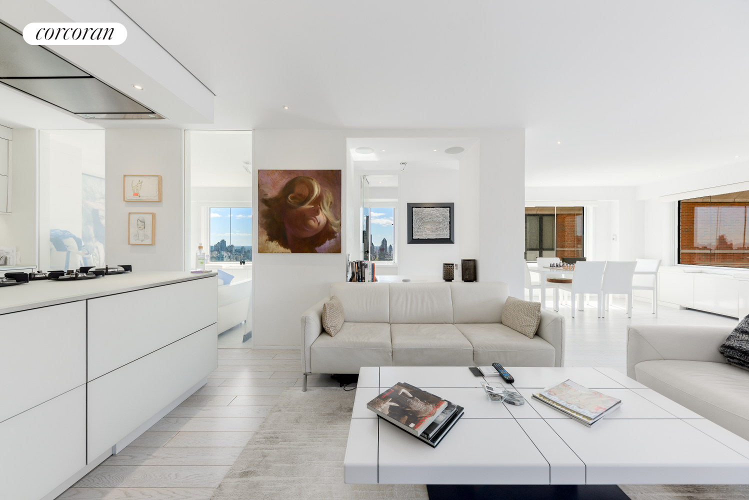 a living room with furniture a rug and a flat screen tv