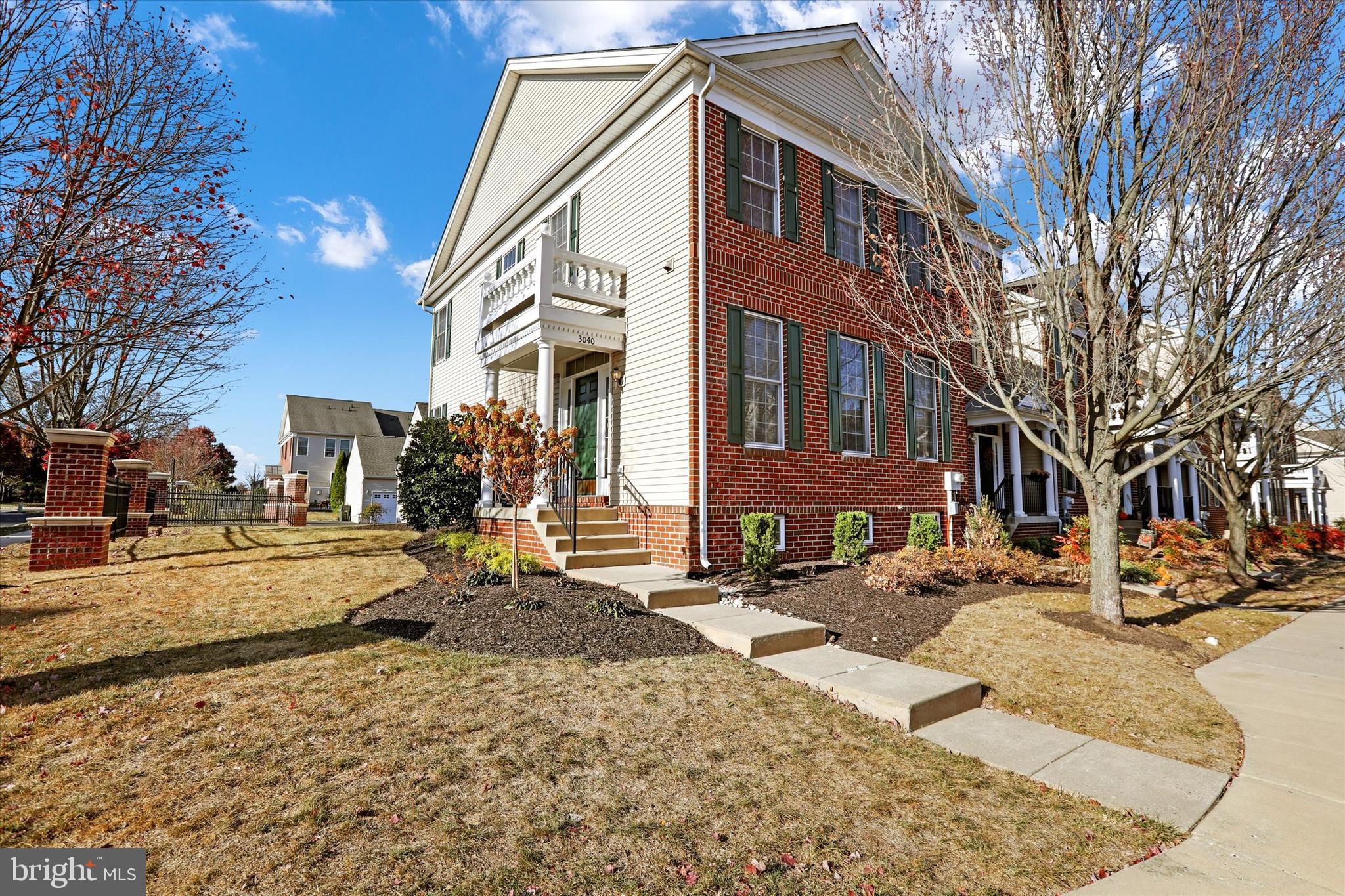 Brick Front Exterior, Portico And Large Side Yard