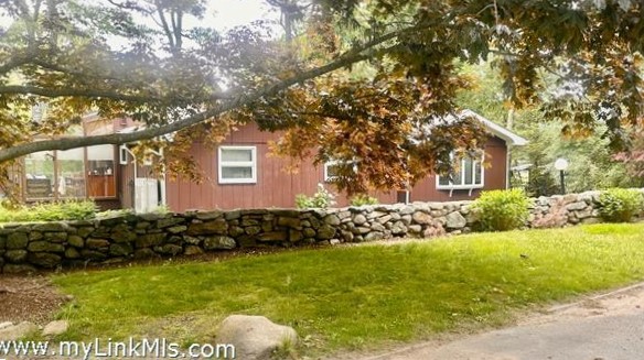 a front view of house with yard