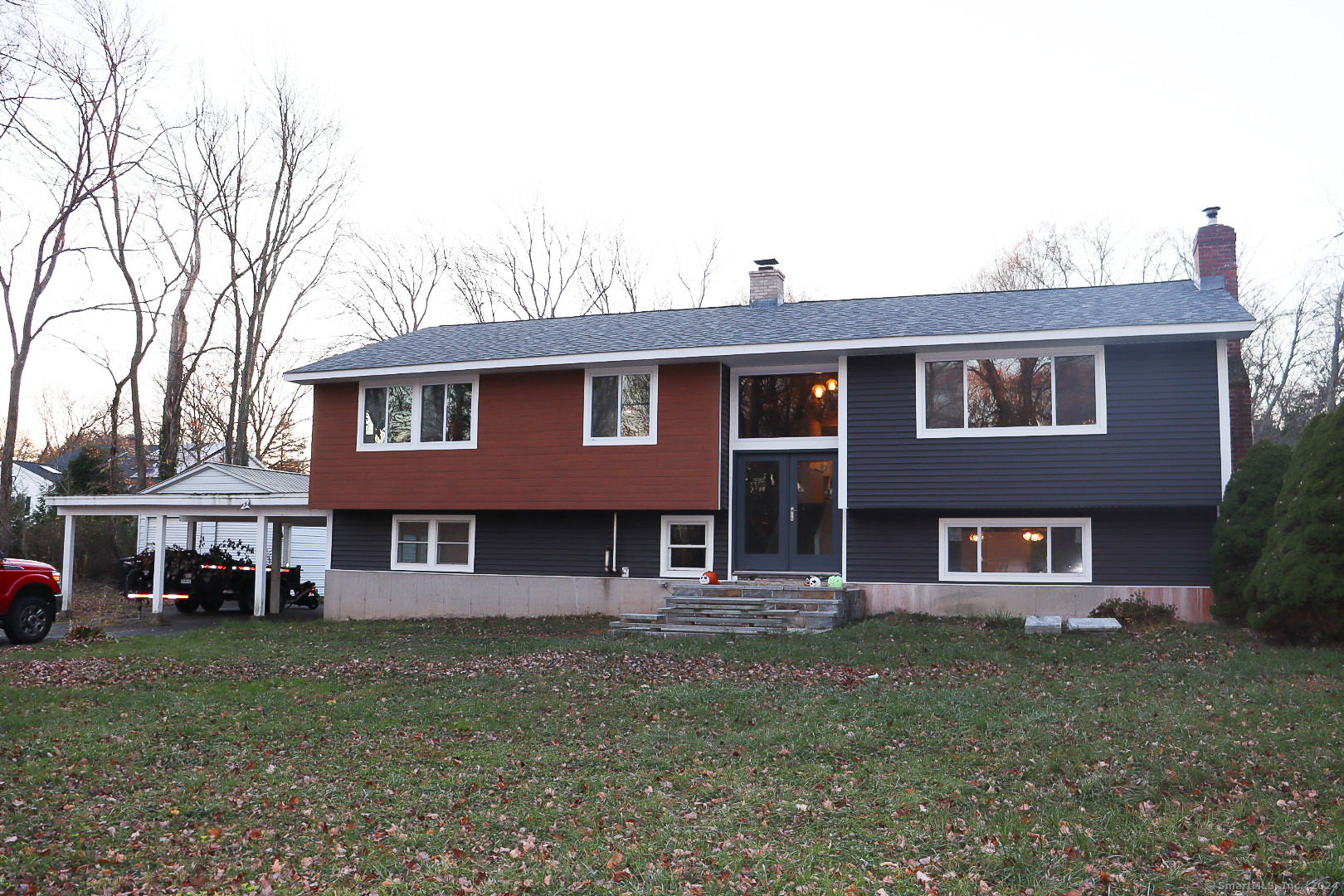 front view of a house with a yard