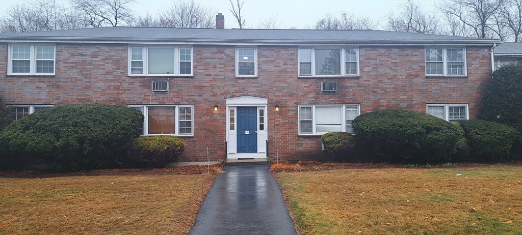 a front view of a house having yard