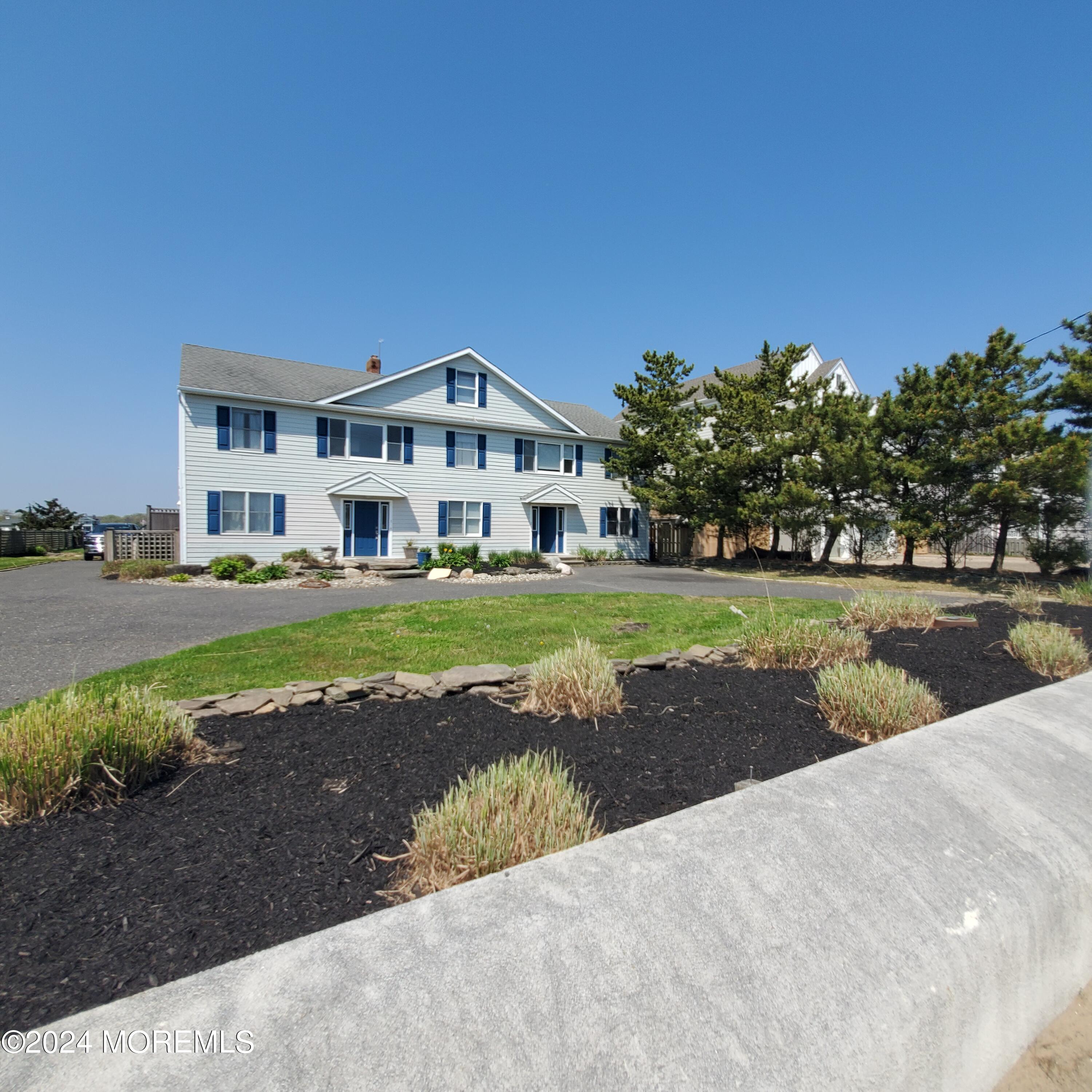 a view of a house with a big yard