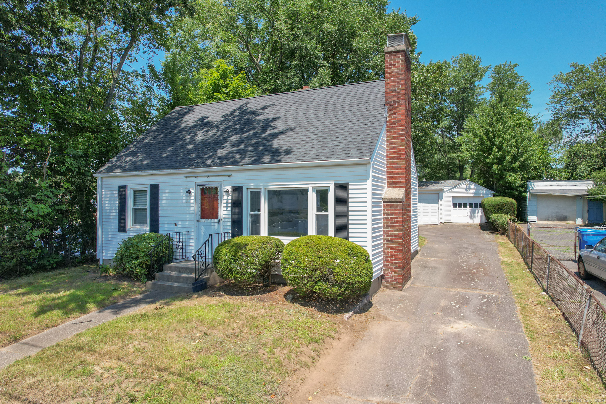 a view of a house with a garden