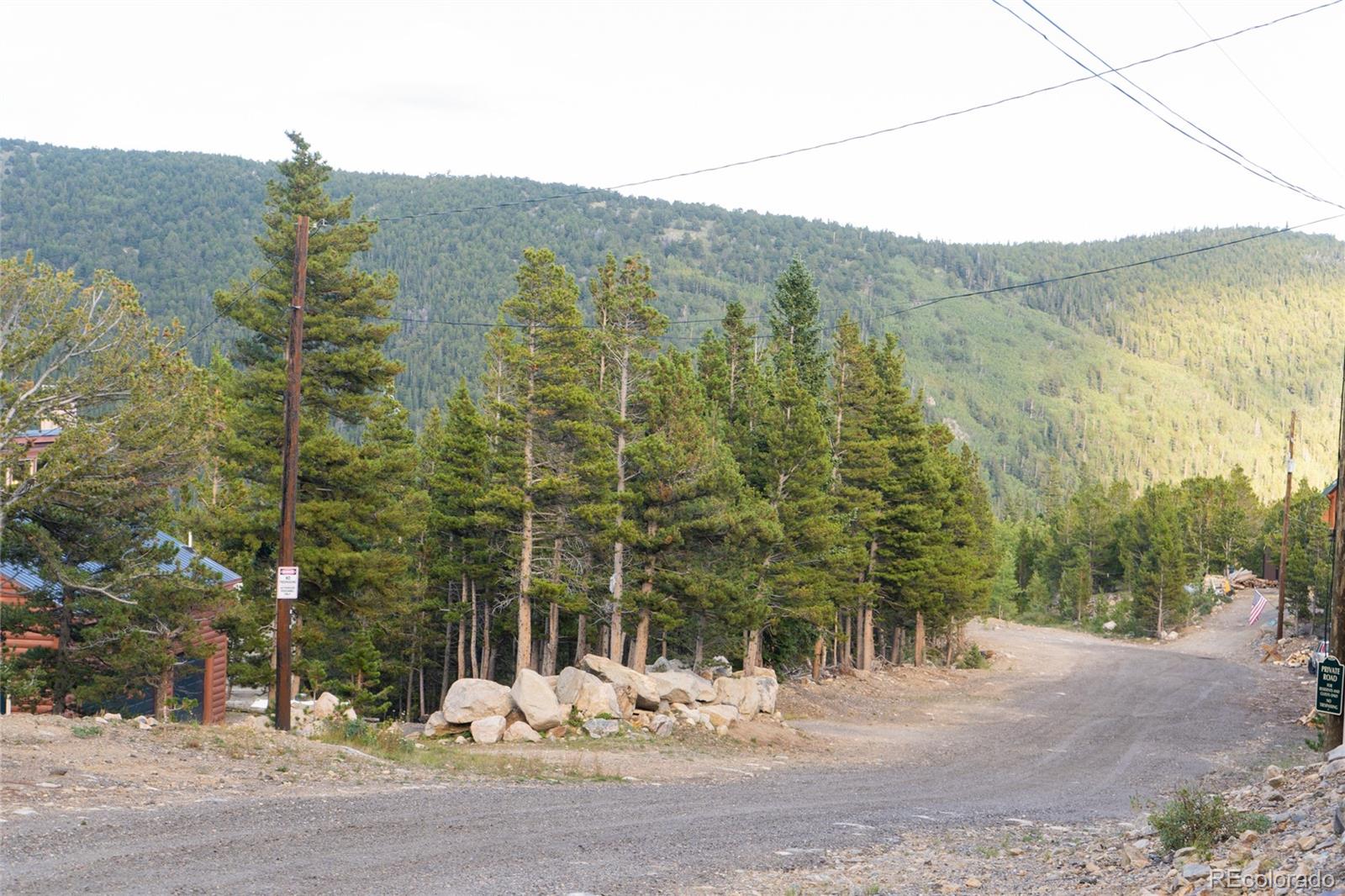 a view of a road with a building in the background