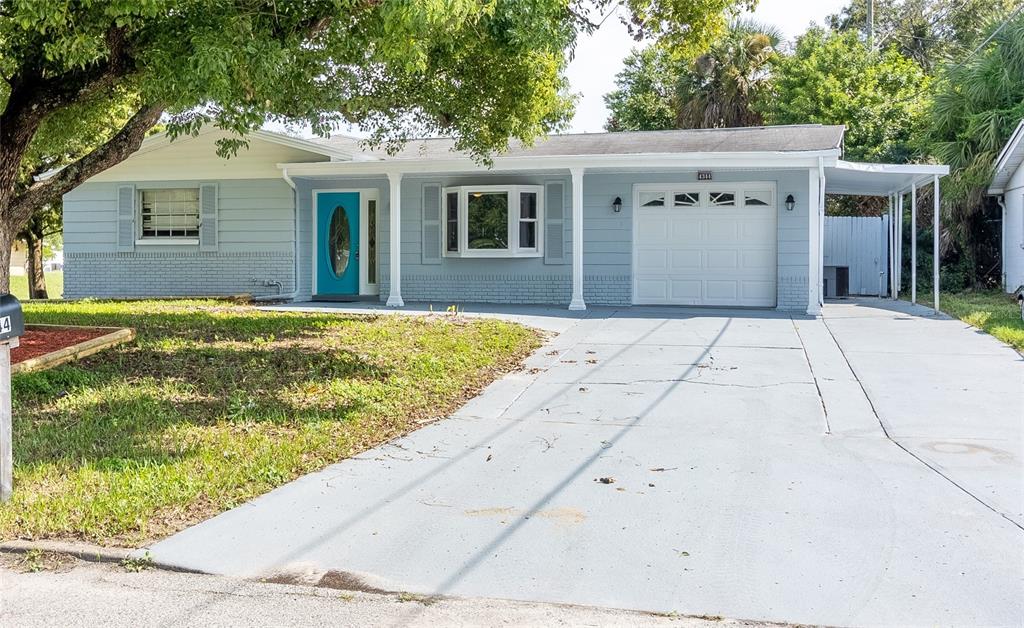 a front view of house with yard