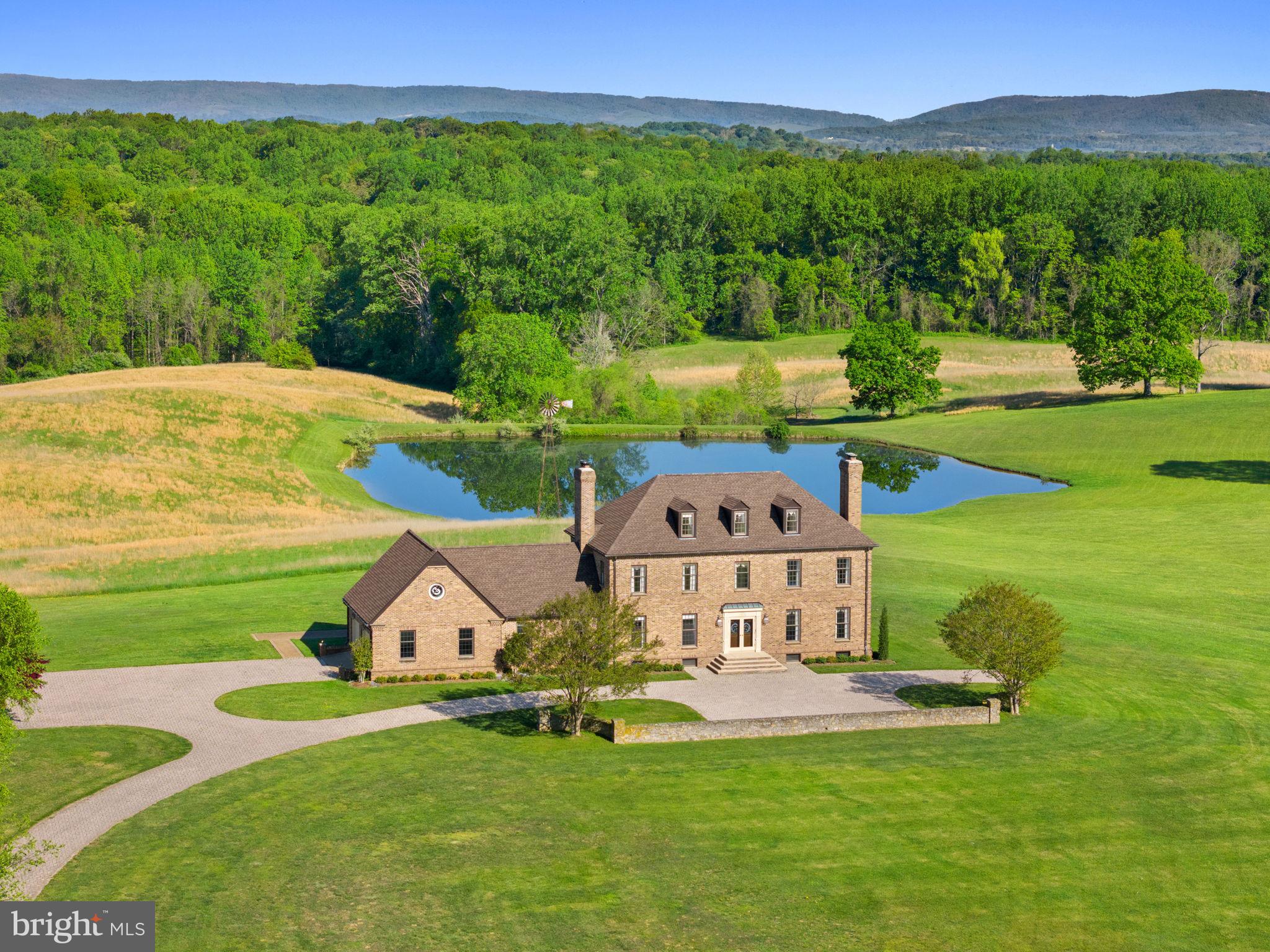 a view of a garden with a house