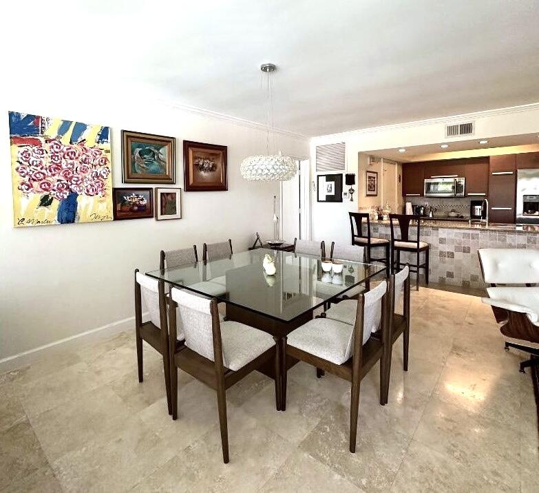 a view of a dining room with furniture