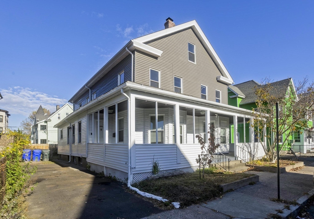 a view of a house with wooden floor and outdoor space